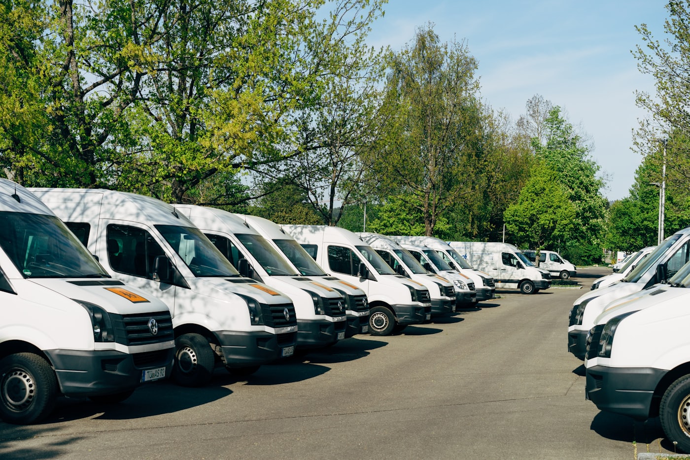 A fleet of delivery vans parked together, the kind of fleet GPS tracking is built for